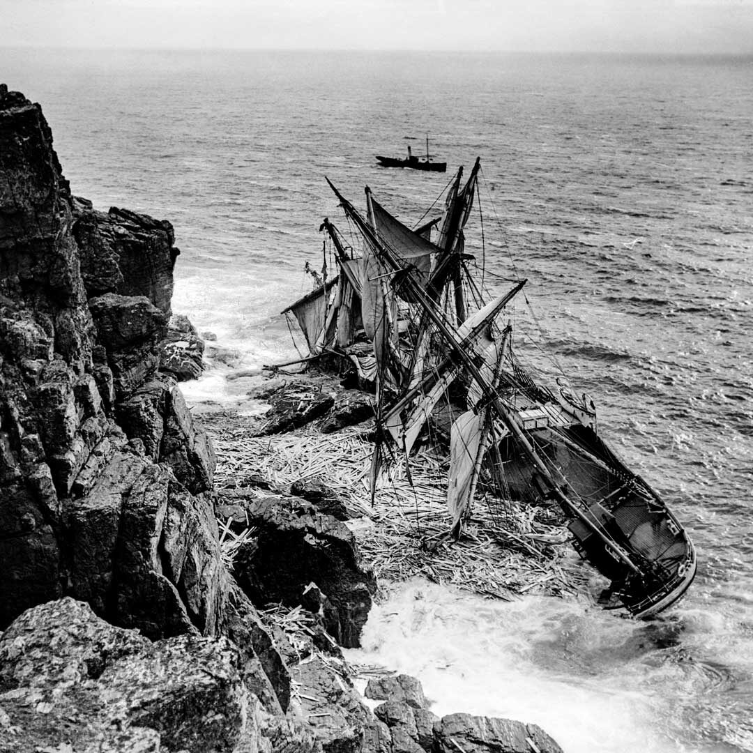 Shipwreck - The magnificent Norwegian full-rigged ship Hansy was lost in Housel Bay near Lizard Point on November 1911. It had been on its way from Sweden to Australia with a cargo of timber when a south-westerly gale drove the ship too close to shore, causing it to strike the rocks. Most of the crew were brought to shore by the Lizard Life Saving Apparatus volunteers using rockets fired with lines attached, then winched across in a breeches buoy.